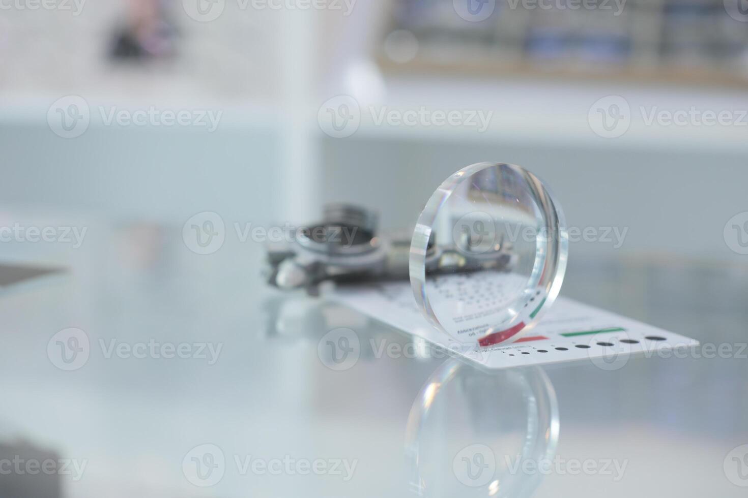 Glasses lenses on the table in optic, eyeglasses lenses photo