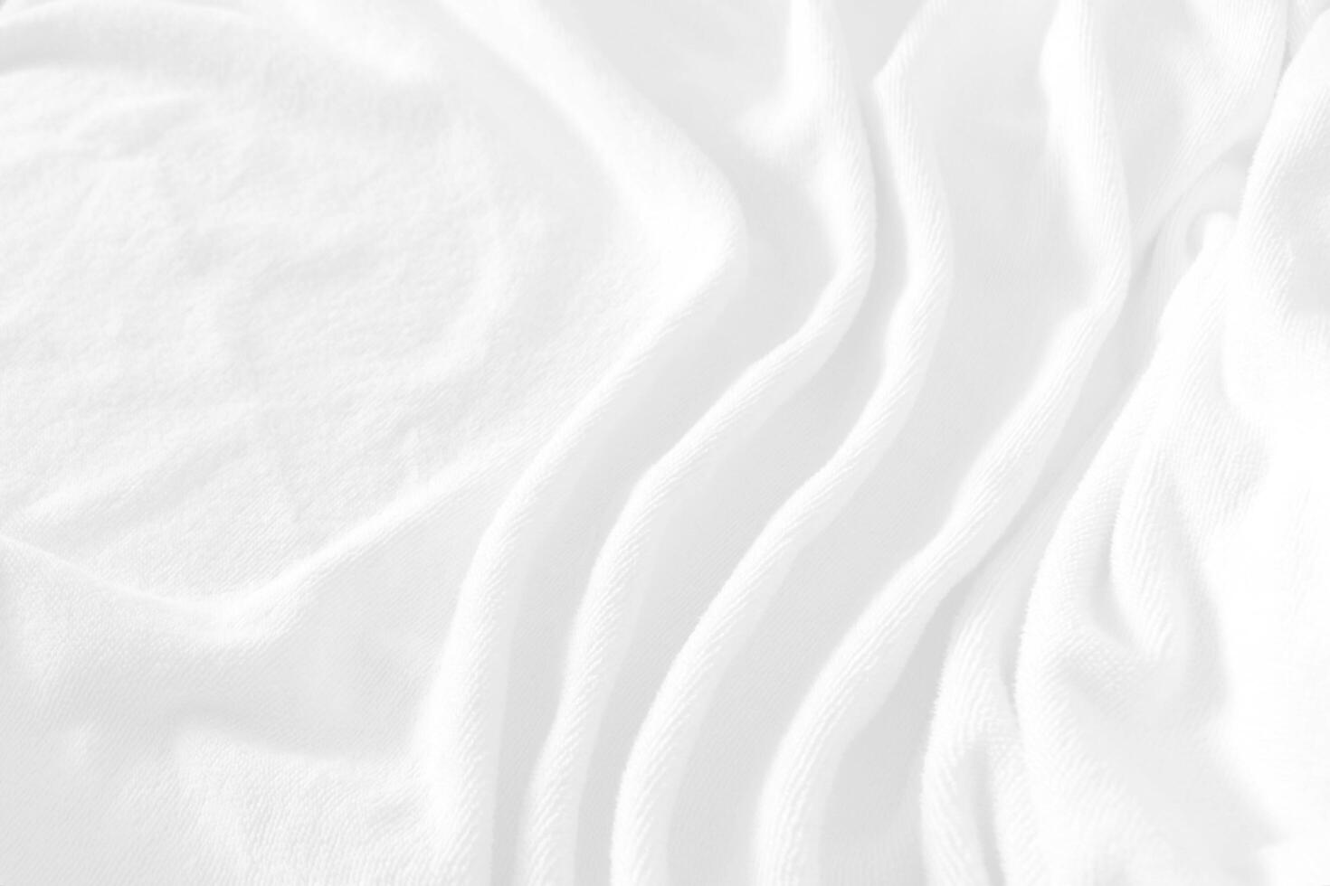 Defocused of abstract white towel background with waves. photo