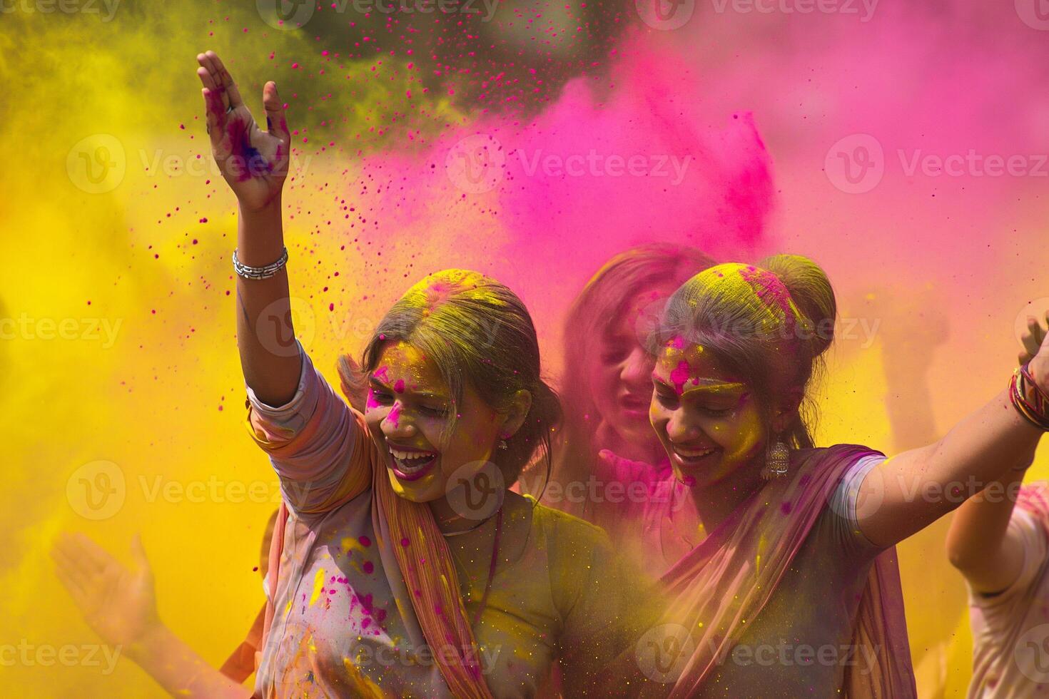 AI generated Cheerful Indian womans covered with colorful powder paint celebrates Holy at Holy festival in India photo