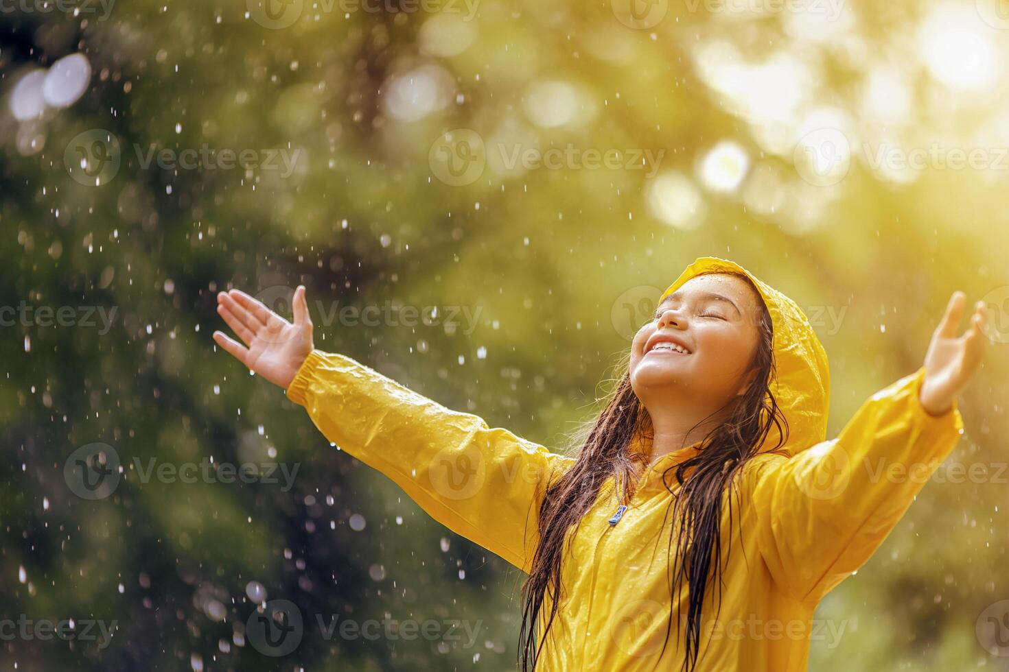AI generated a little girl in a yellow raincoat rejoices while standing in the spring rain photo