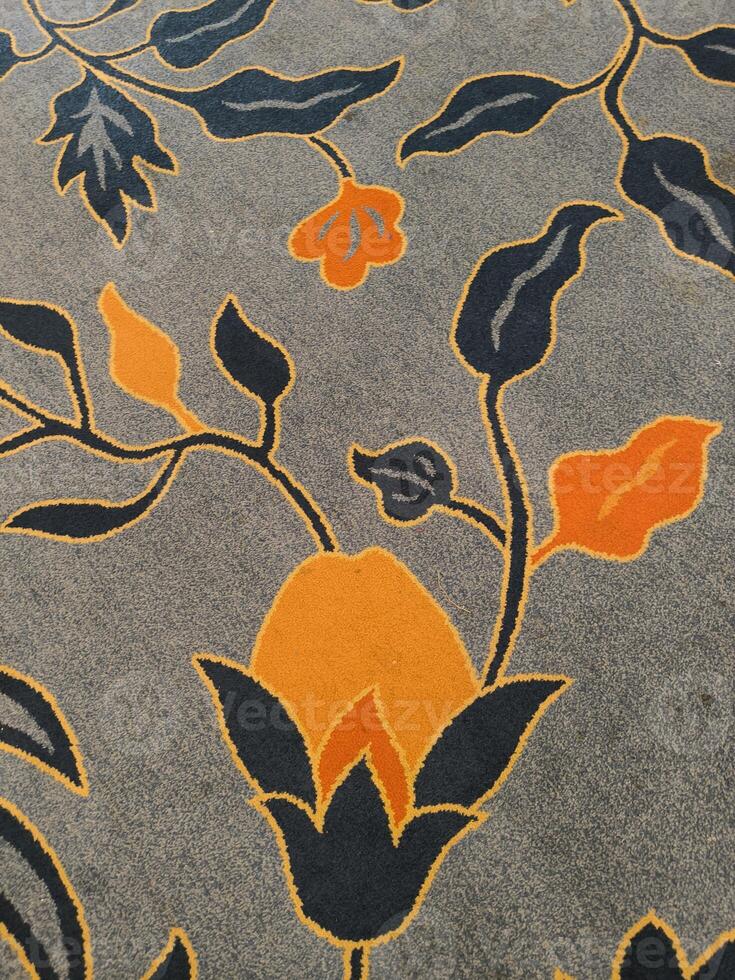 Traditional flowers painting pattern on carpet photo
