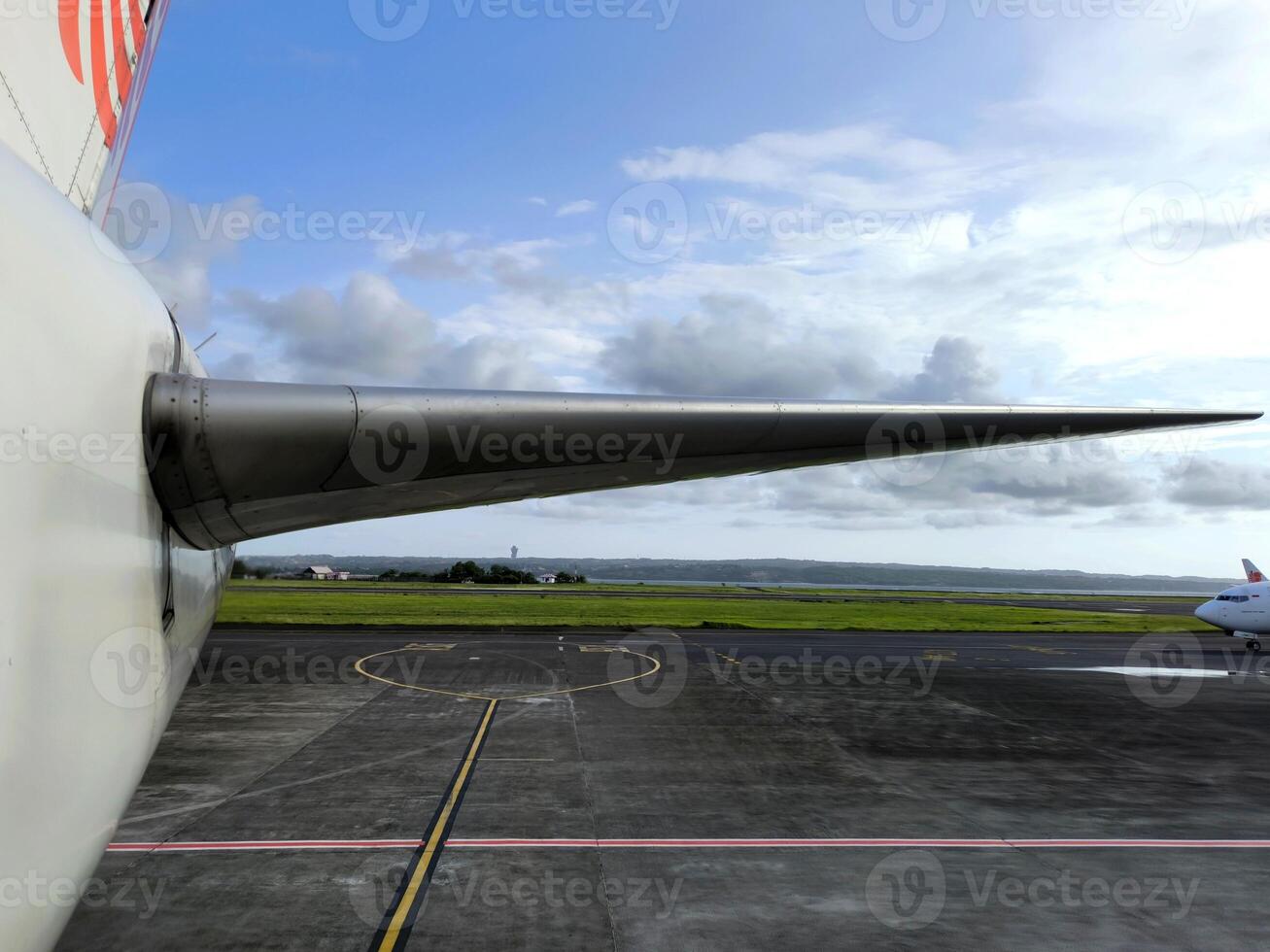 Commercial airplane tail wing photo