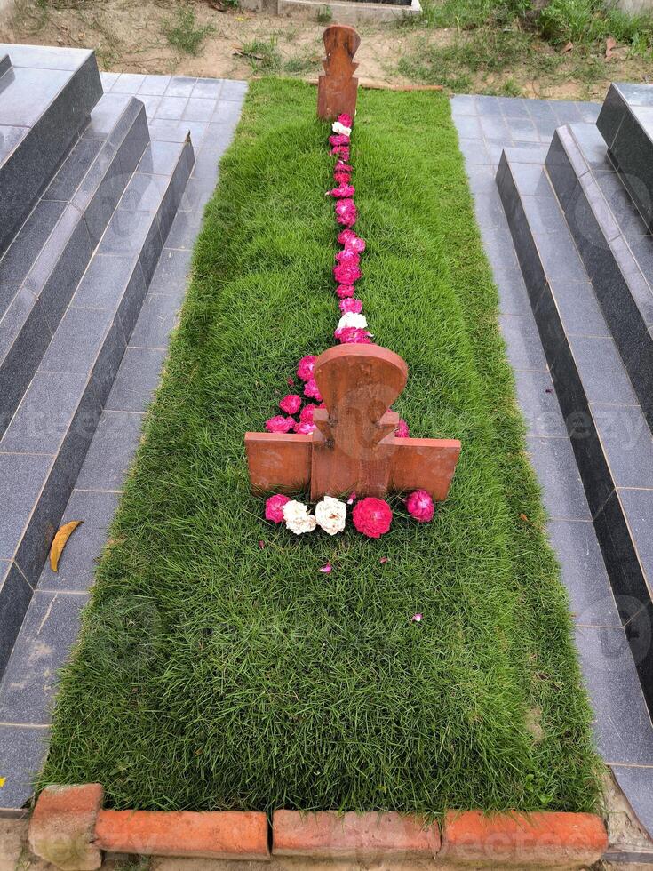 Muslim graves in Indonesia are decorated with manila grass plants and