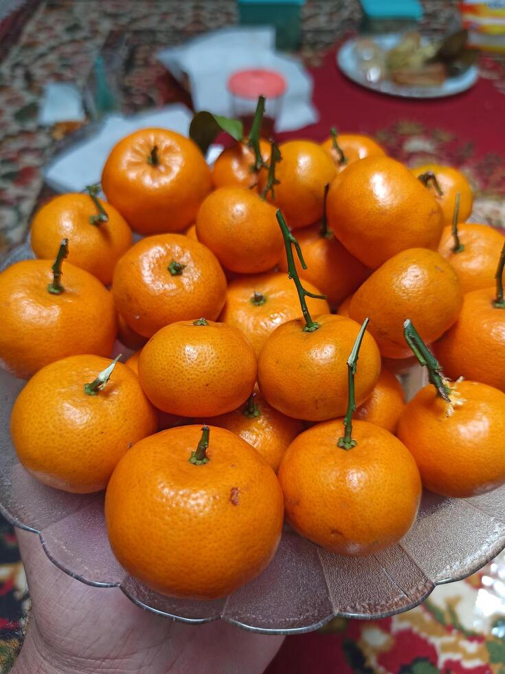 Citrus fruit with bright orange color photo