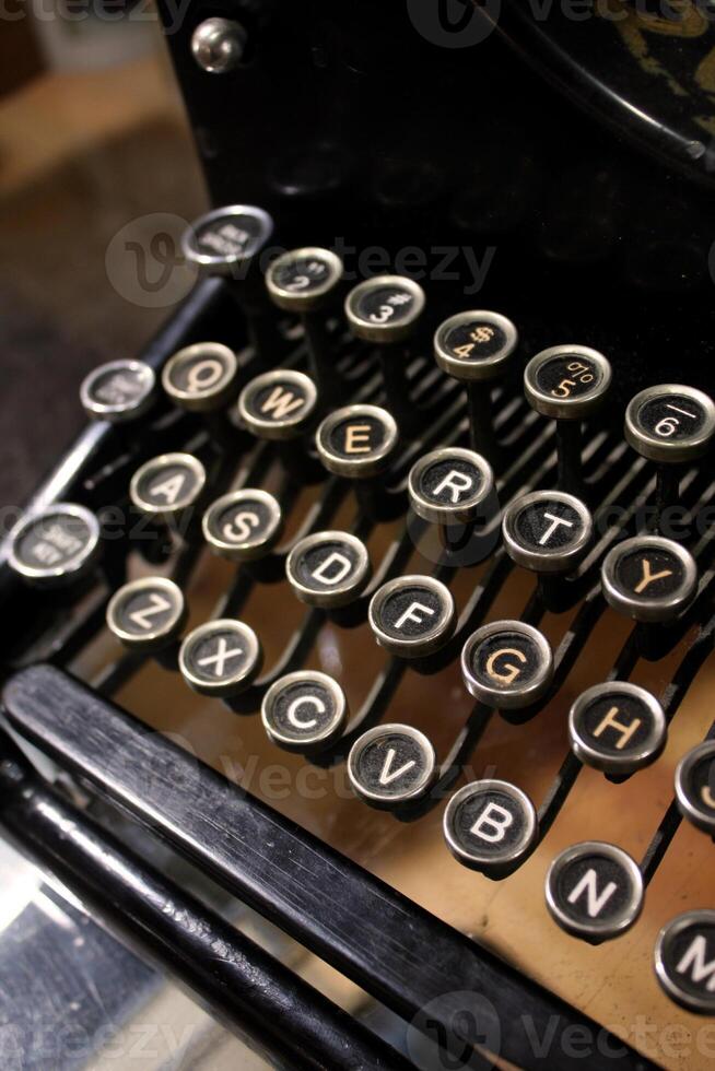 Vertical Shot of Vintage Typewriter and Keys photo