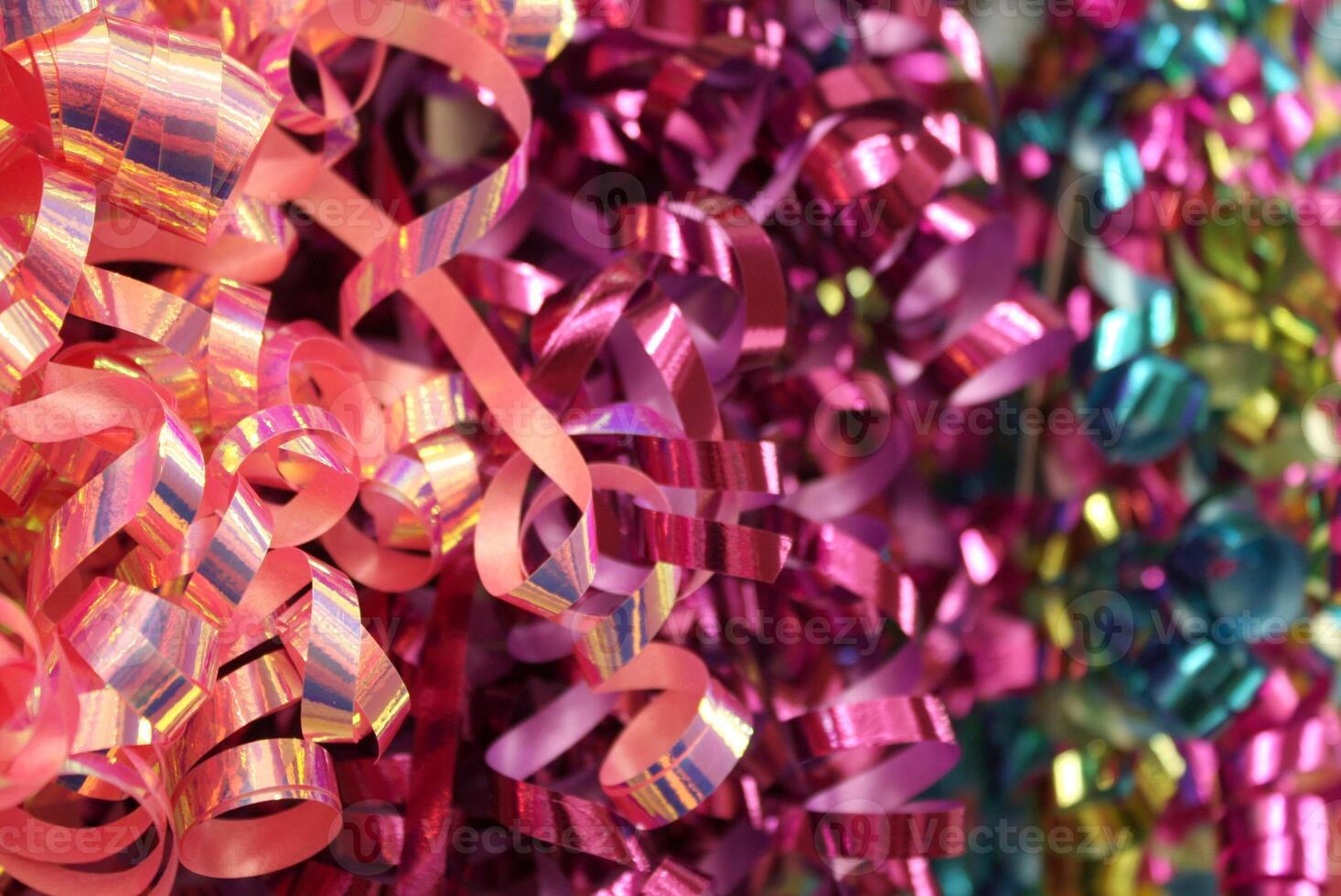 Brightly Colored Curled Ribbon Background Texture photo