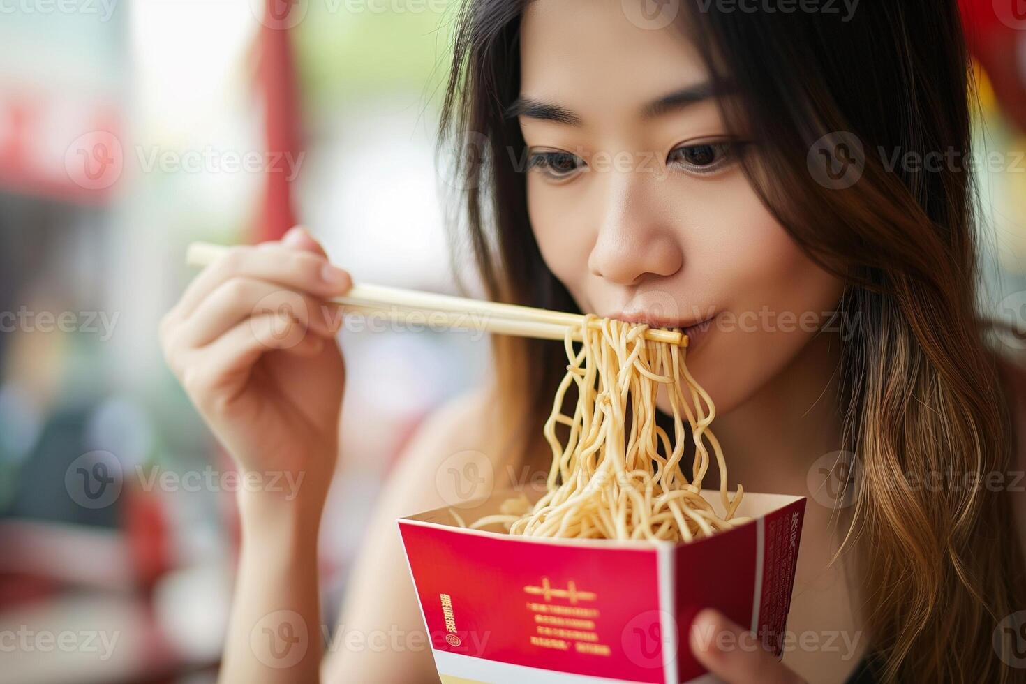 AI generated Young woman eating Chinese noodles from a box photo