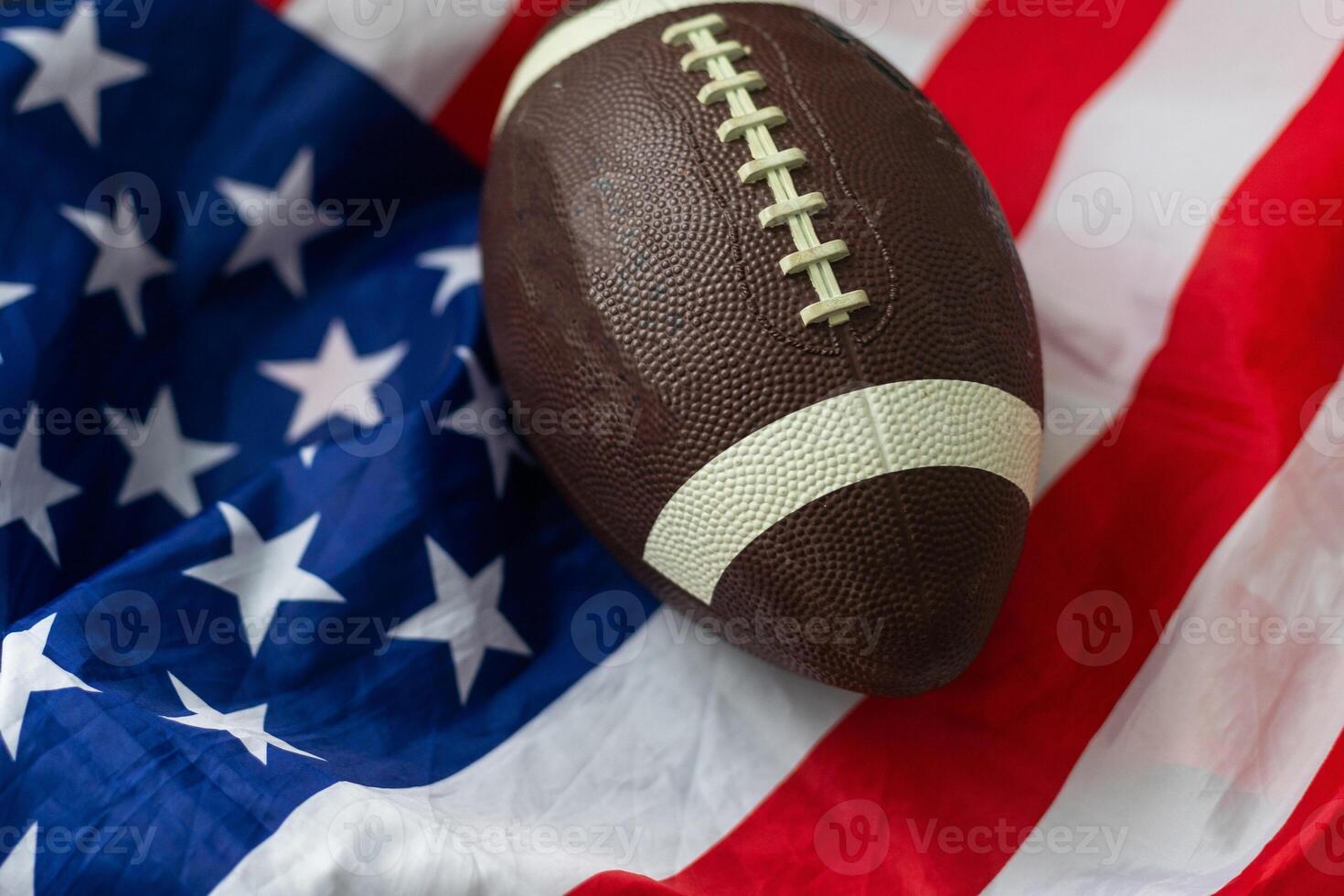 American football ball. American football with American flag. dark background. Team sport concept. copy space. space for text. American football background. America Soccer ball. photo