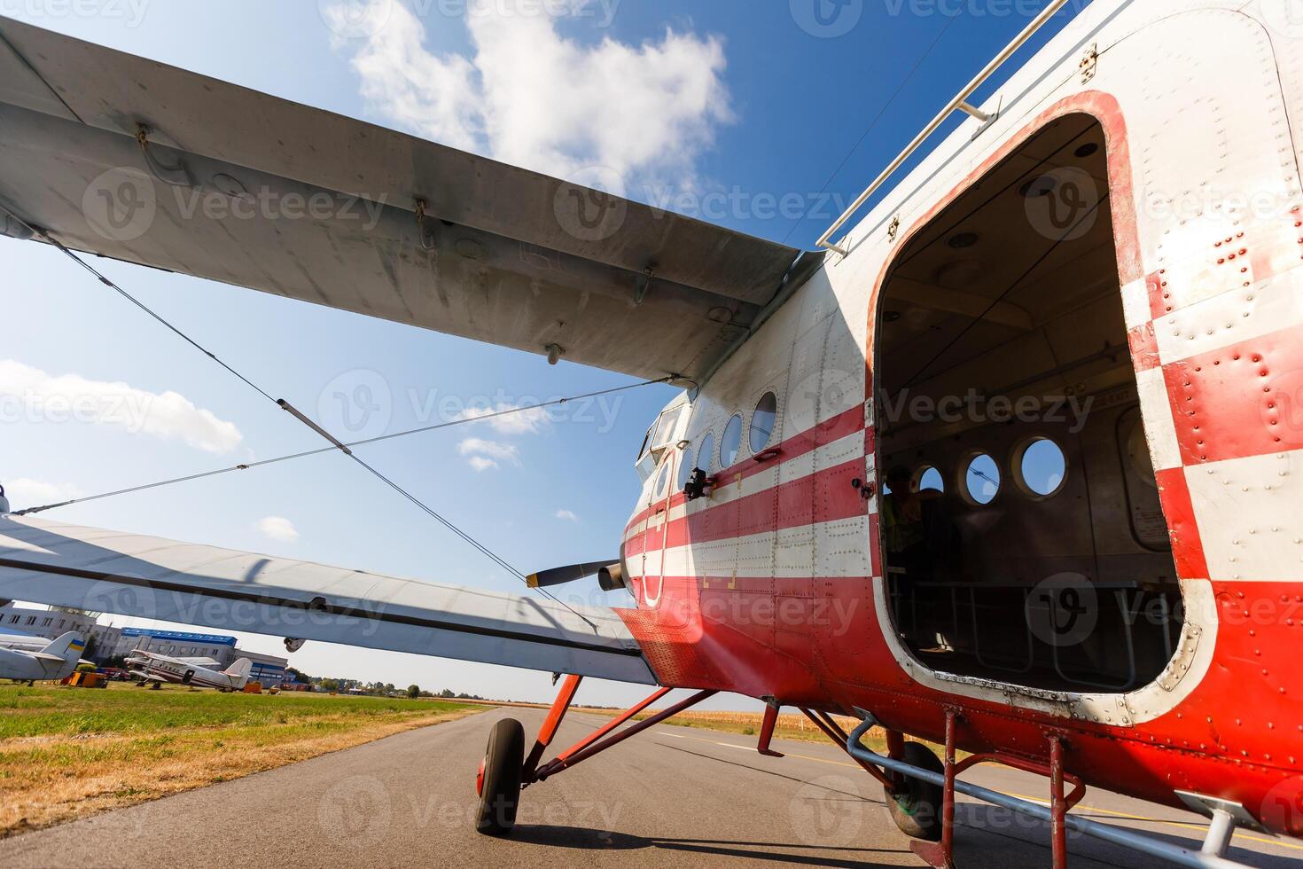 light aircraft returning to land after dropping photo