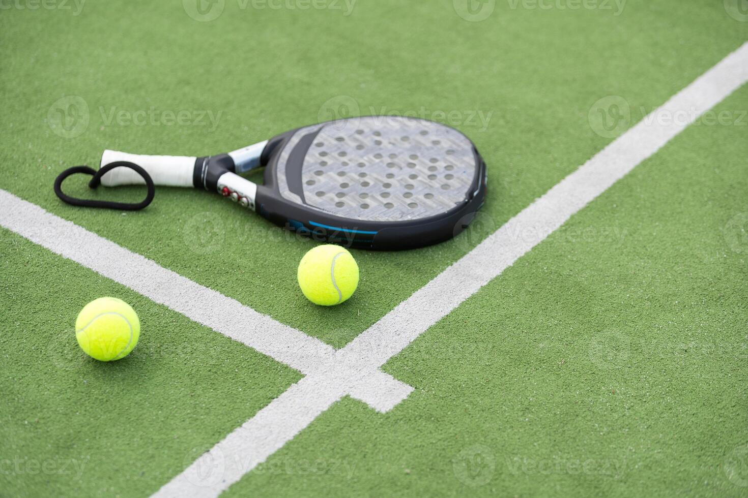 Paddle tennis racket and ball photo