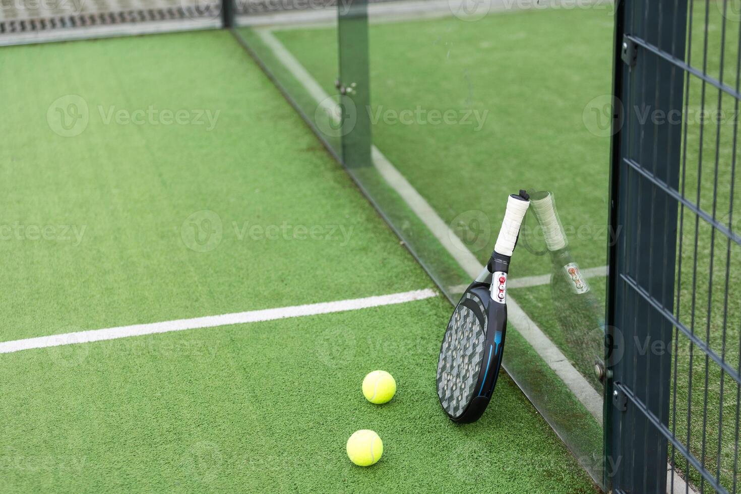 White professional paddle tennis racket with natural lighting on blue background. Horizontal sport theme poster, greeting cards, headers, website and app photo