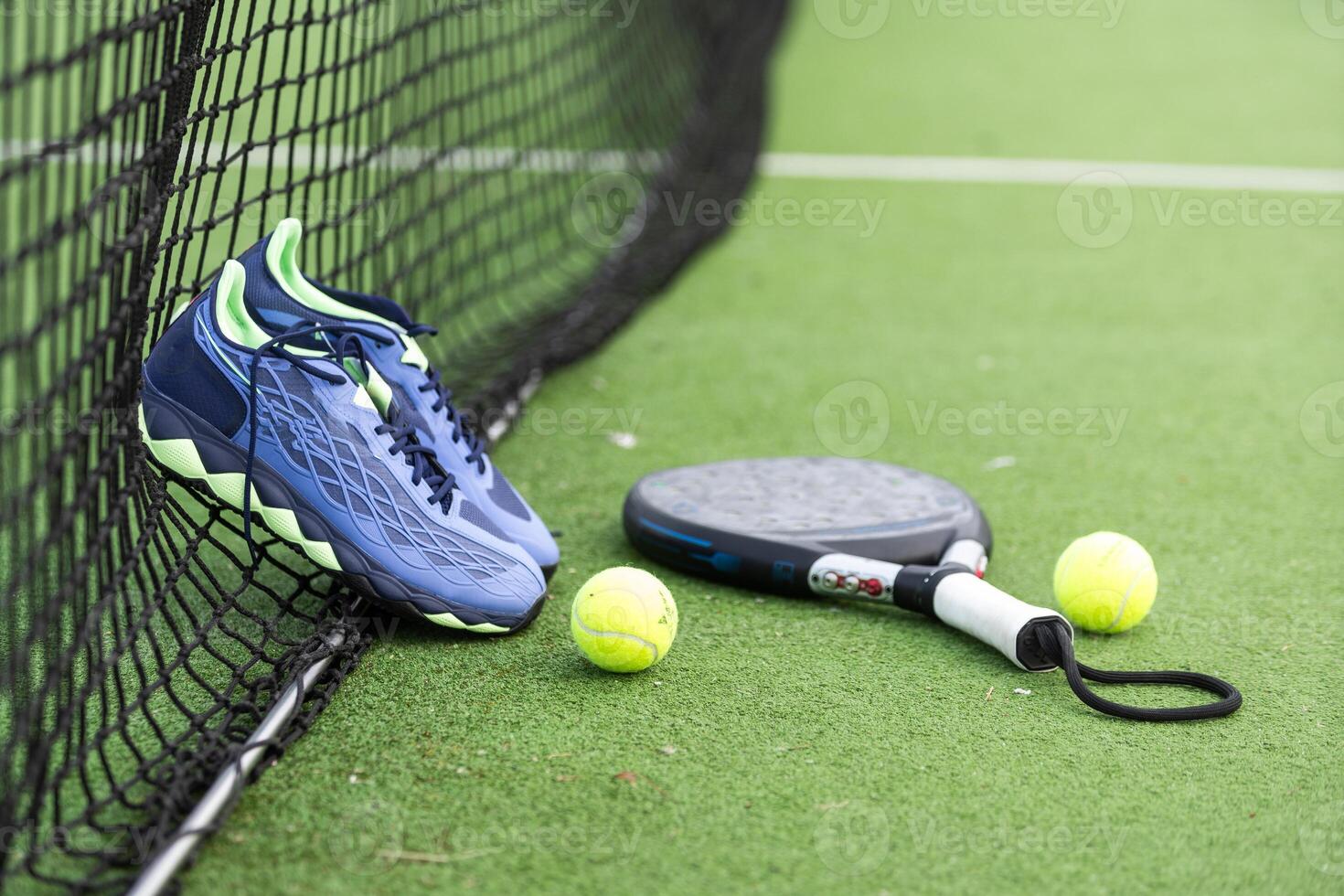 Paddle tennis and artificial grass, close up image photo