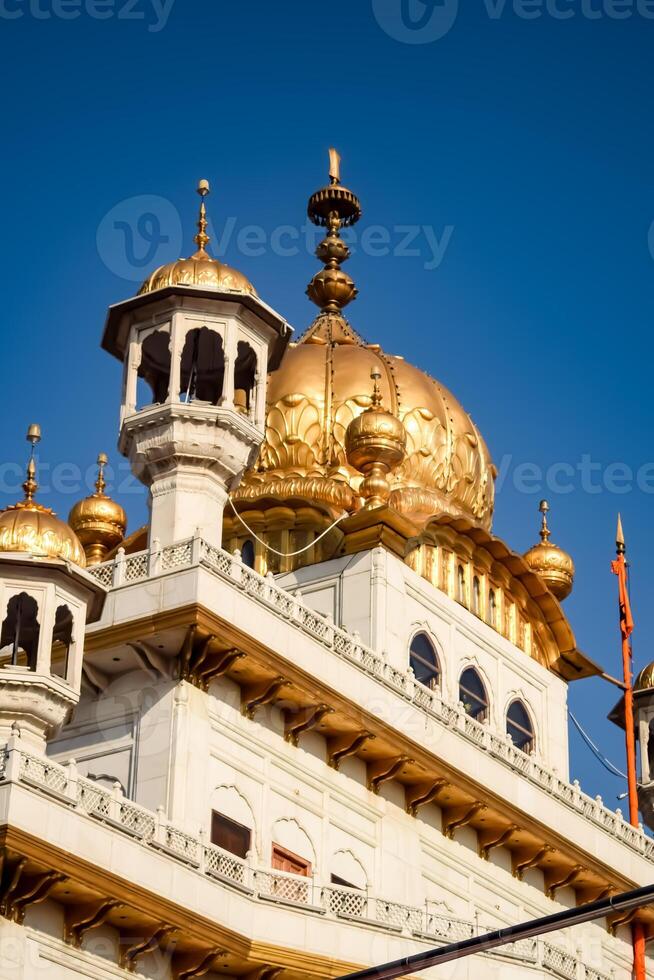 View of details of architecture inside Golden Temple - Harmandir Sahib in Amritsar, Punjab, India, Famous indian sikh landmark, Golden Temple, the main sanctuary of Sikhs in Amritsar, India photo