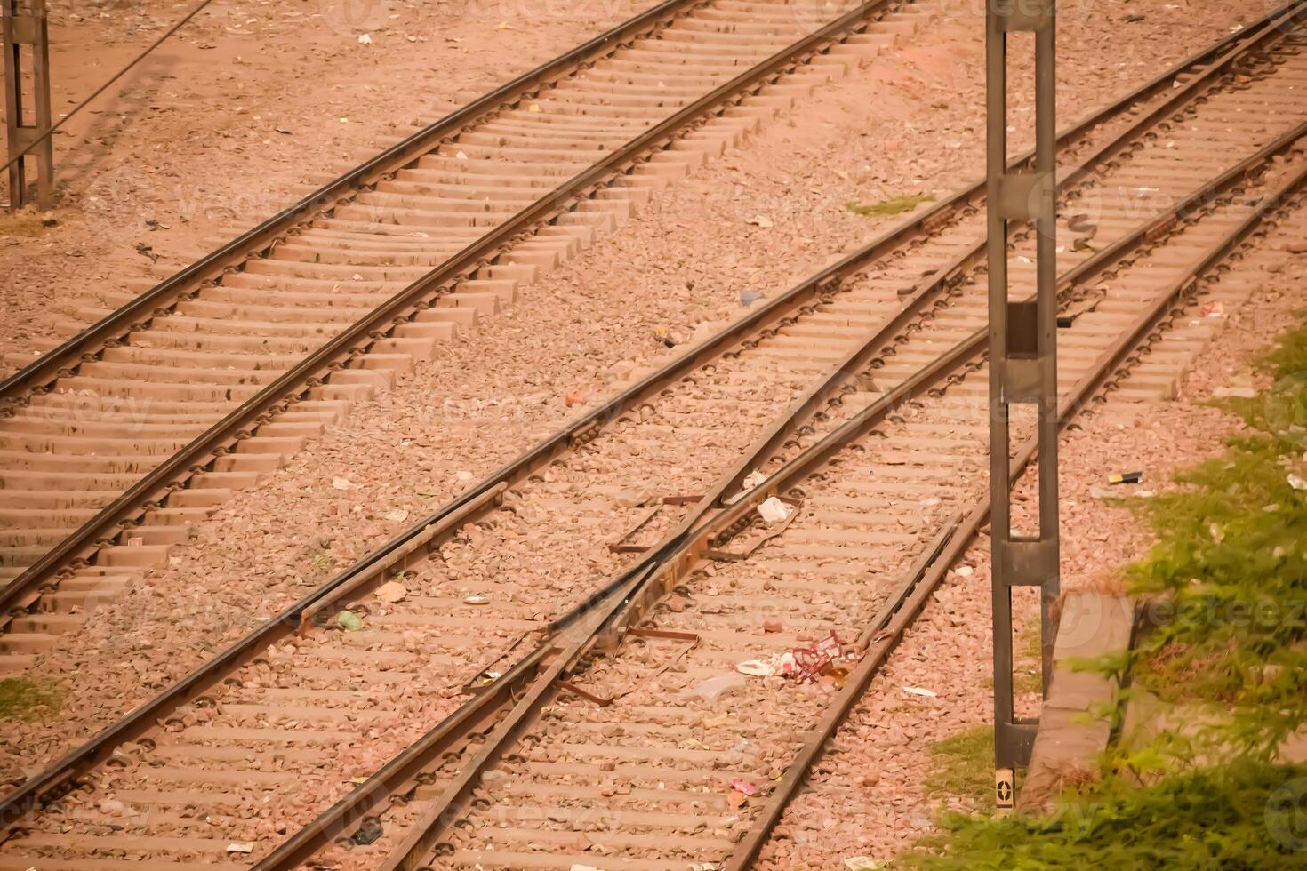 View of train Railway Tracks from the middle during daytime at Kathgodam railway station in India, Train railway track view, Indian Railway junction, Heavy industry photo