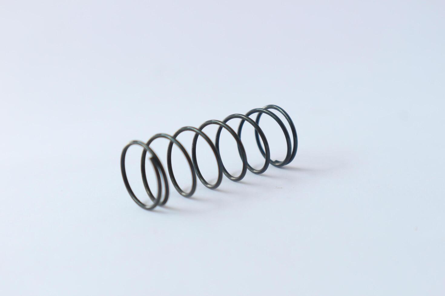 Metal steel spring spare parts for industry. photo