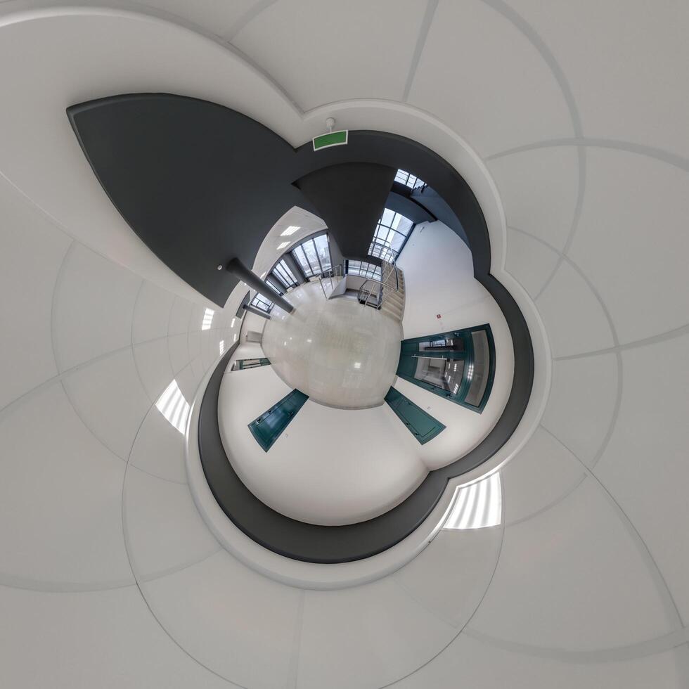 abstractly twisted into a spherical 360 panorama interior of a modern office with a hall staircase and panoramic windows photo