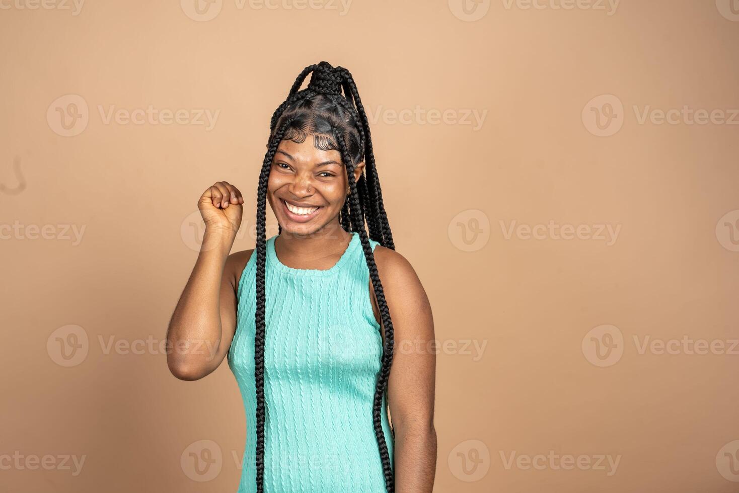 Portrait of surprised african girl opened mouth in amazement photo