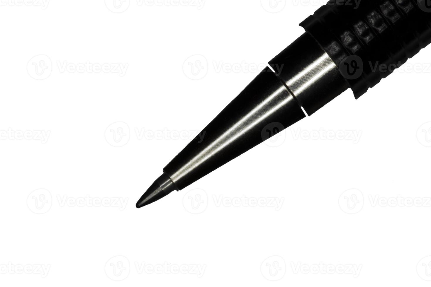 Closeup of tip ball point pen on white photo