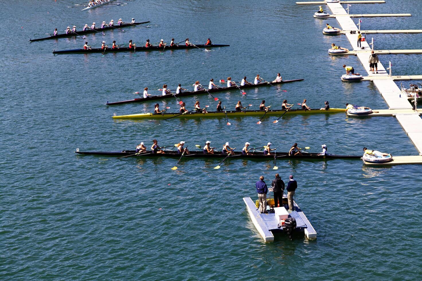 Folsom, CA, 2011 - Several Women's Crew Row Teams Leaving The Dock photo
