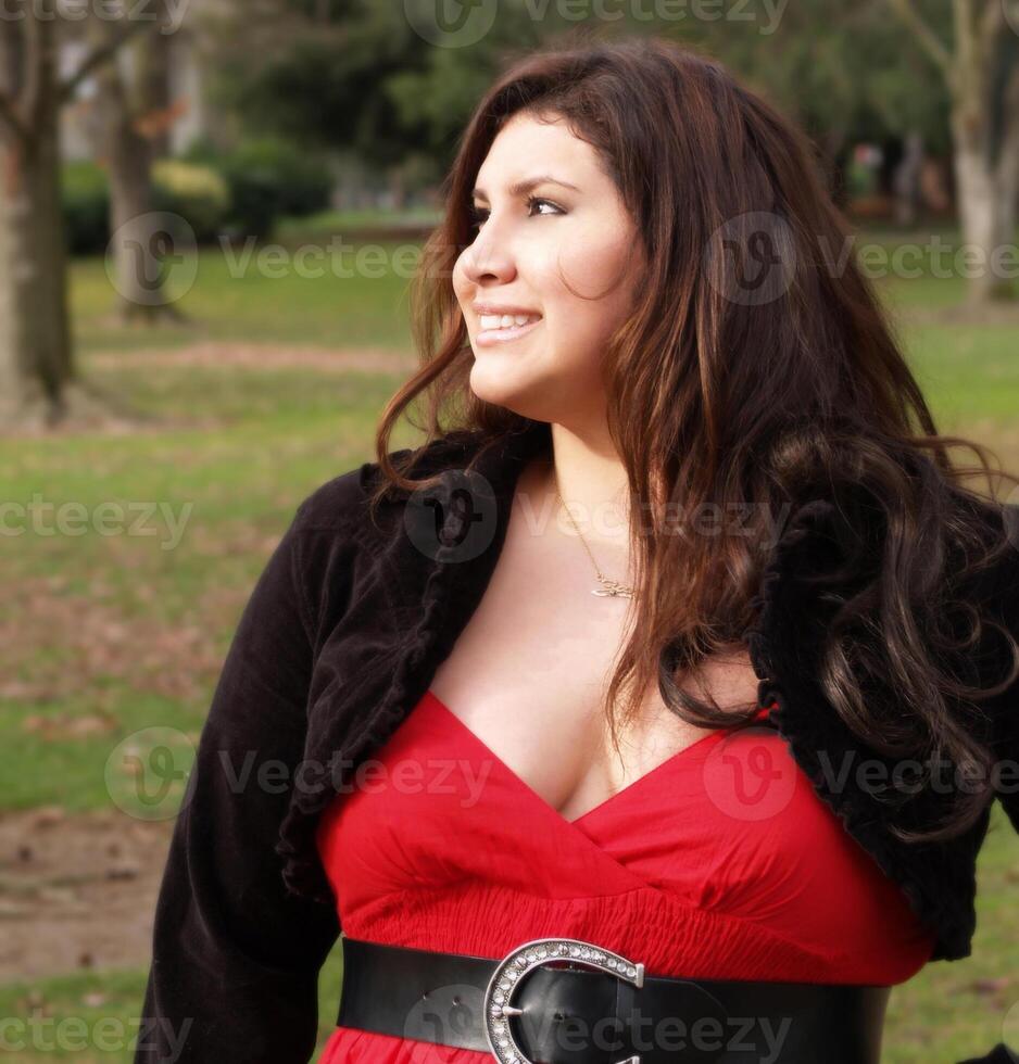 Plus-size woman in red dress photo