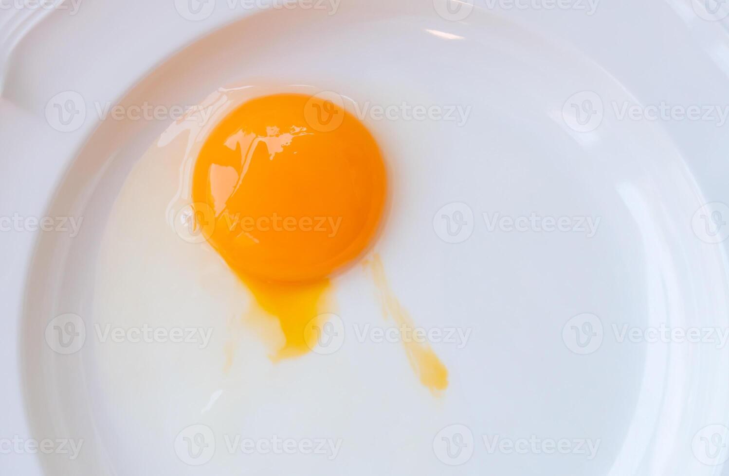 Raw food of chicken eggs without shell in white plate prepared for cooking food photo