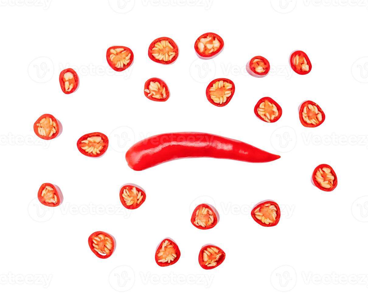 Top view of single fresh red chili pepper with slices or pieces isolated on white background with clipping path photo