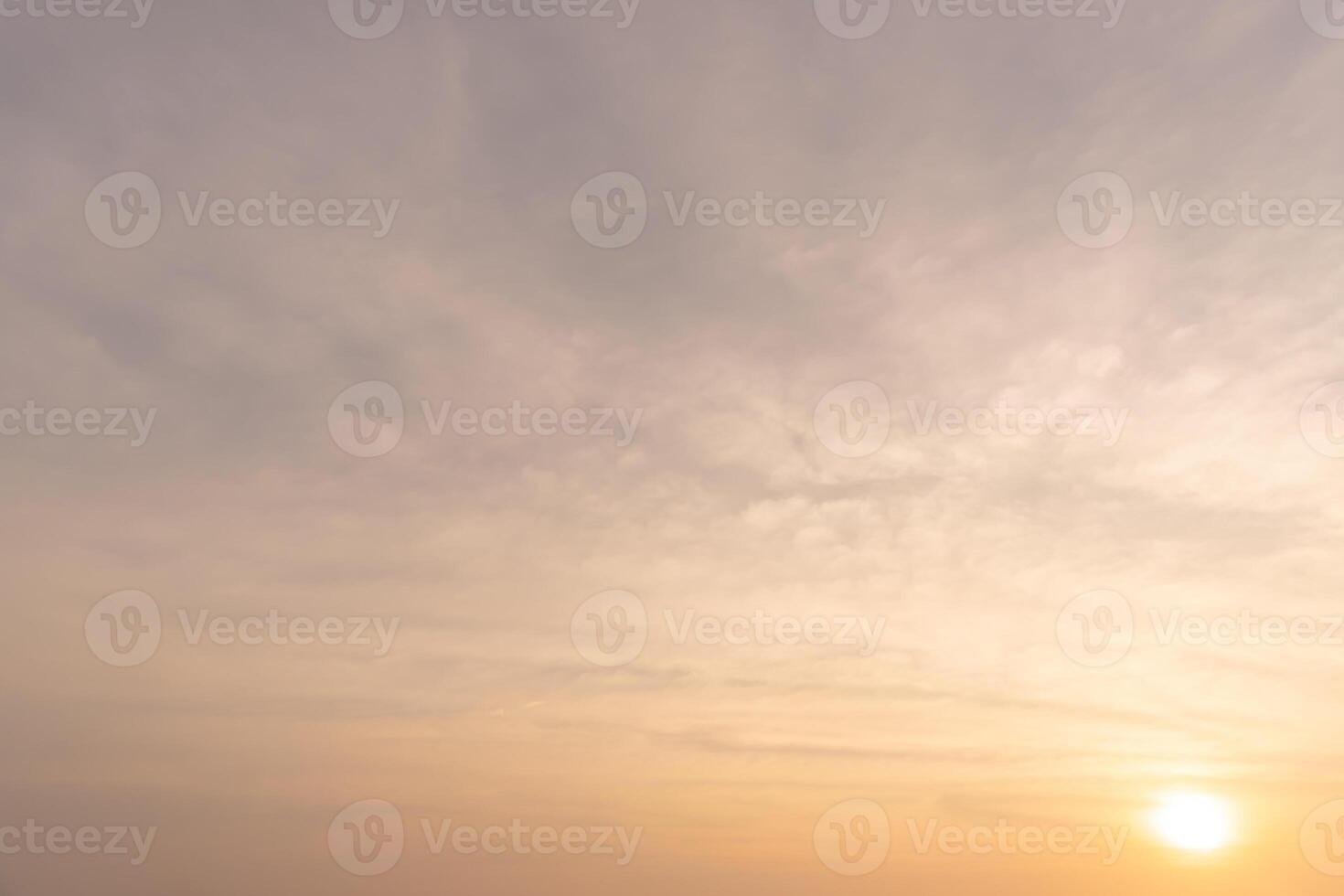 Beautiful morning or evening orange sky when sun set or sun rise used as natural background texture in decorative art work photo