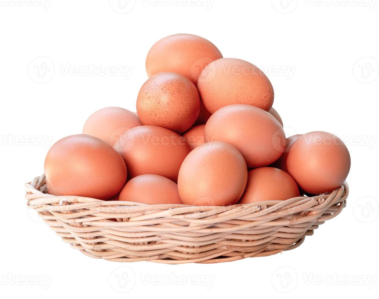 Front view of fresh chicken eggs in woven bamboo basket isolated on white background with clipping path photo