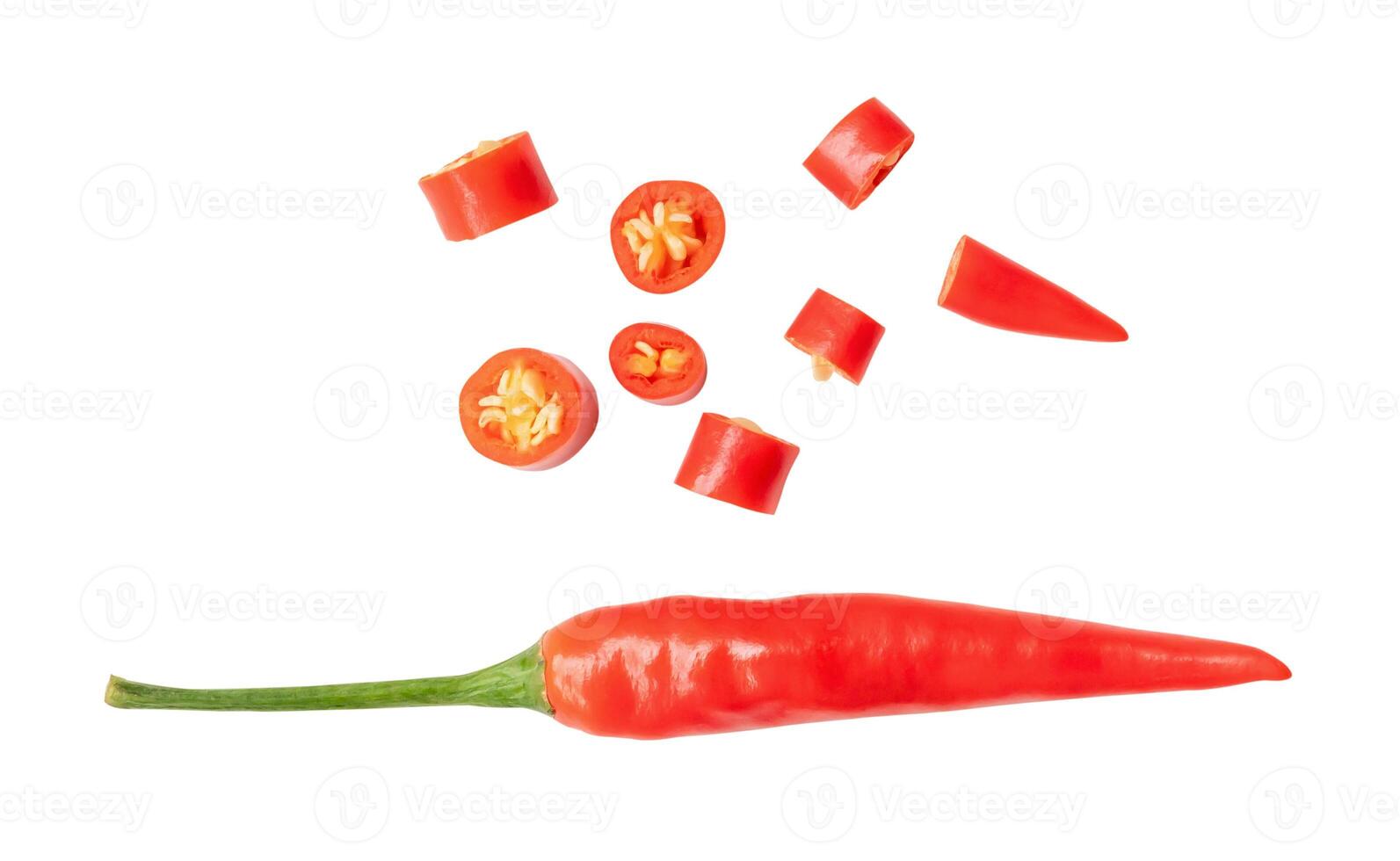 Top view of single fresh red chili pepper with slices isolated on white background with clipping path photo