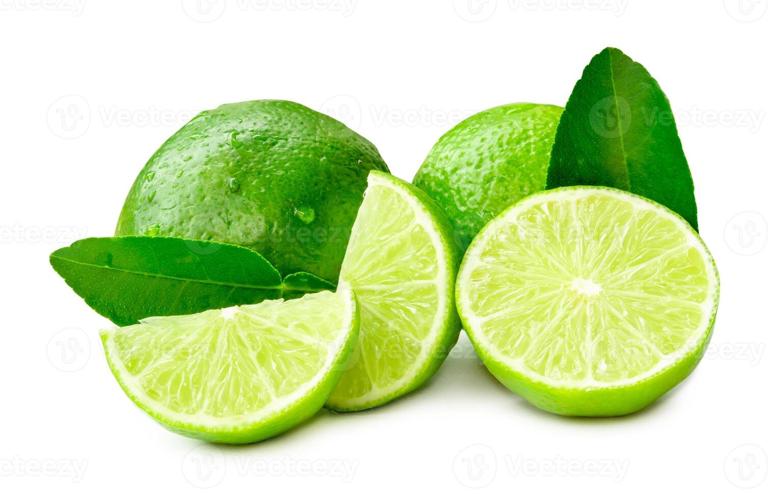 Front view of green lemon fruits and leaves with half and slices or quarters isolated on white background with clipping path photo