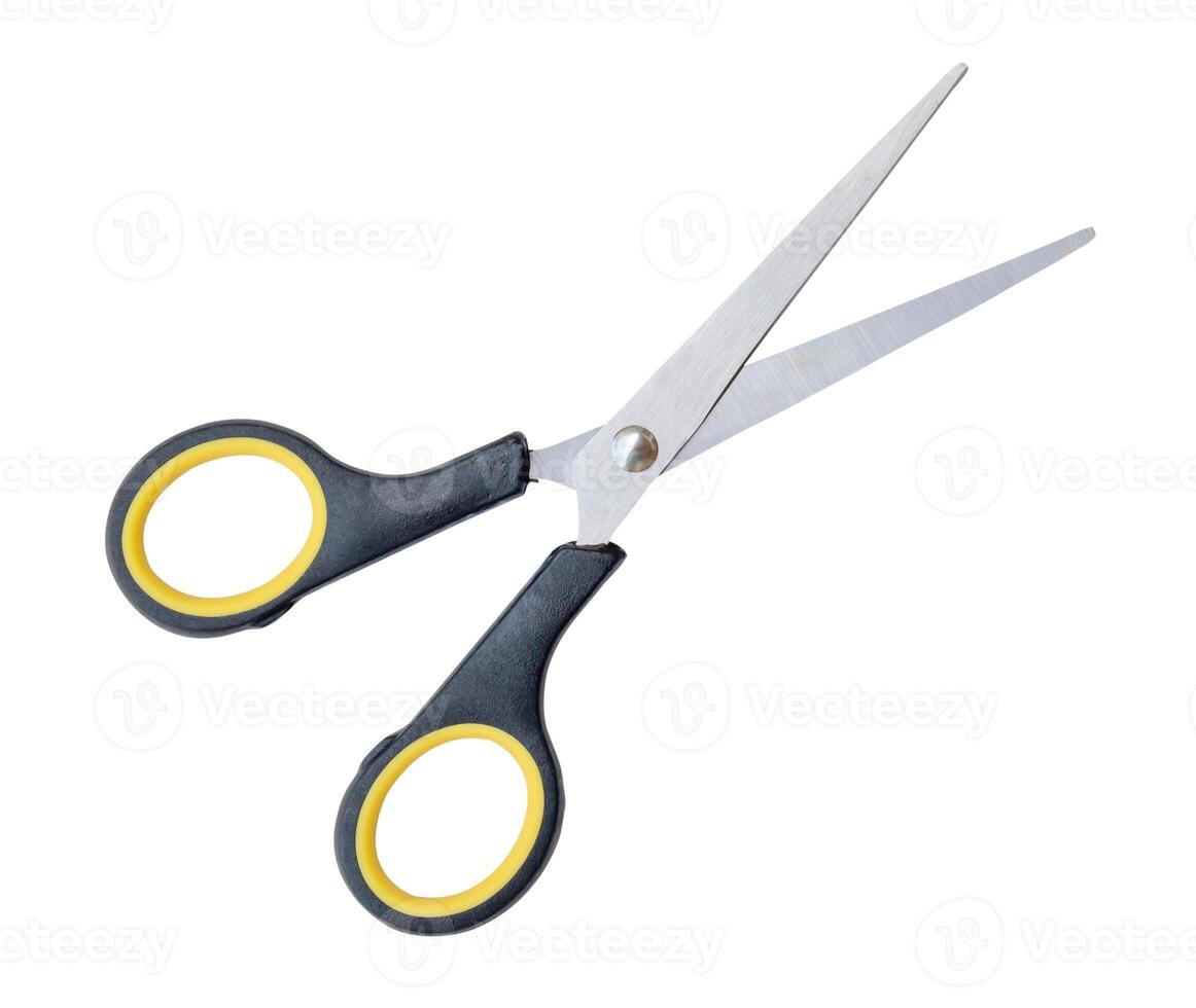 Top view of a pair of small multipurpose scissors with black handle isolated on white background with clipping path photo
