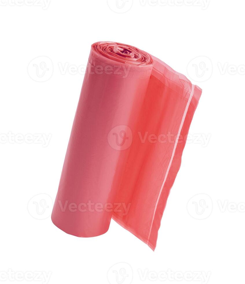 red roll of garbage bags isolated on white background photo