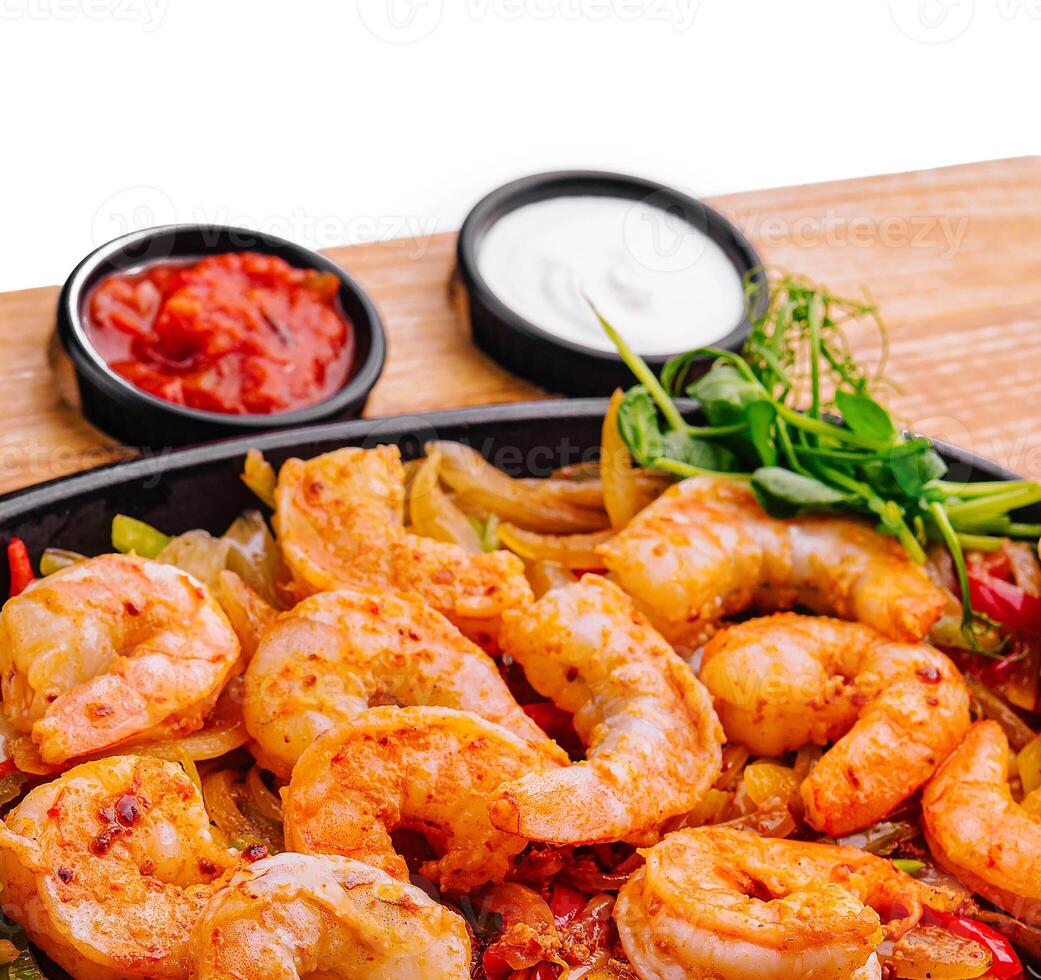 Stir fry with shrimps with red and yellow paprika photo