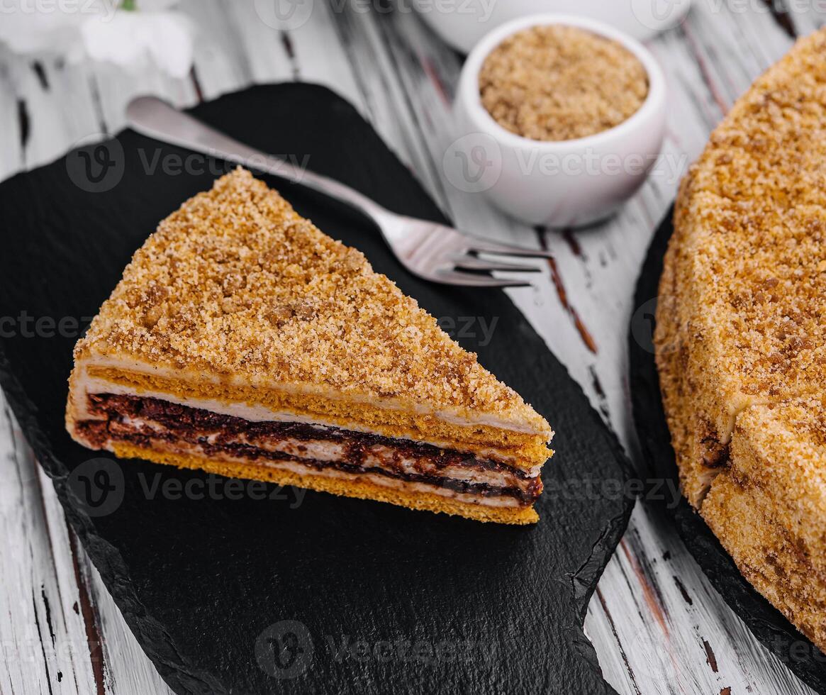 Traditional dessert honey cake with walnut photo