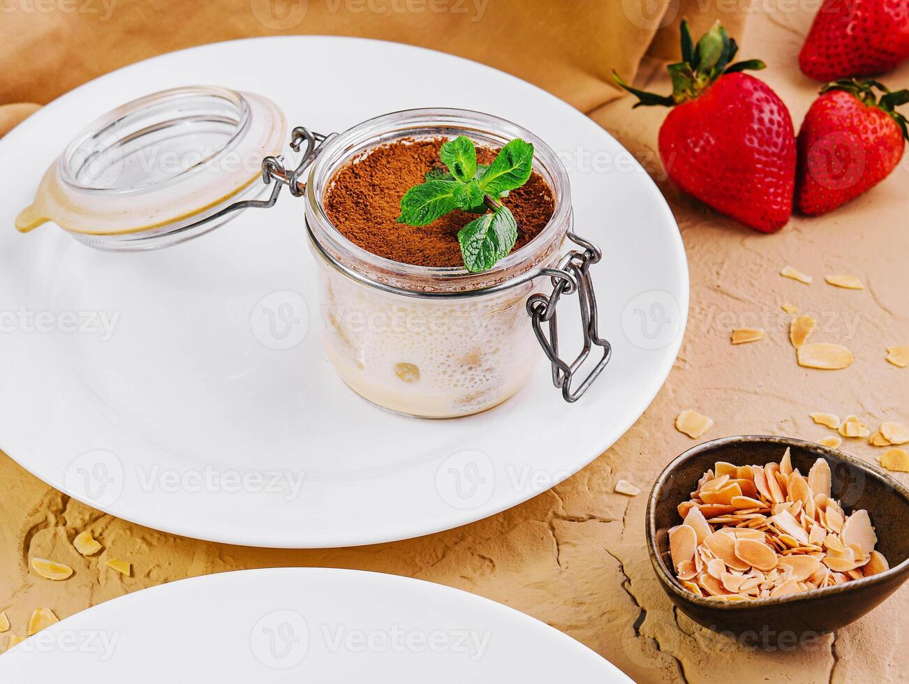 tiramisu in a glass jar top view photo