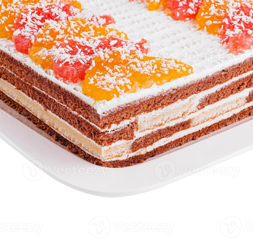 layered chocolate cake with oranges and grapefruits photo