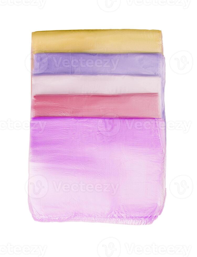 multi-colored transparent plastic bags isolated on white photo