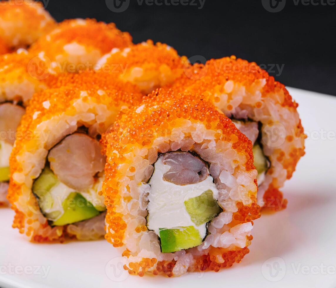 california sushi roll with shrimp on plate photo