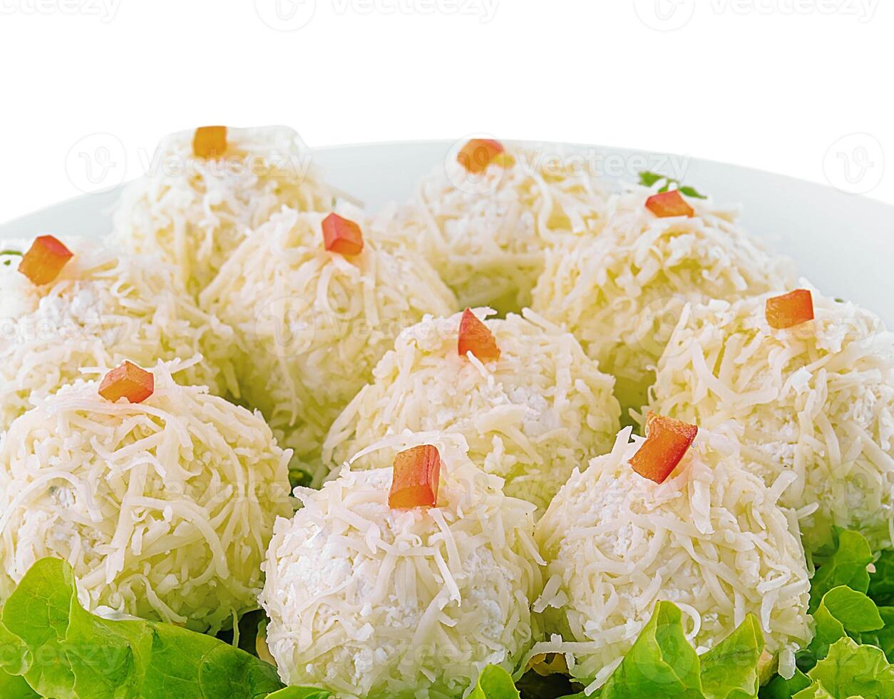 Cheese balls with garlic and mayonnaise on lettuce leaf photo