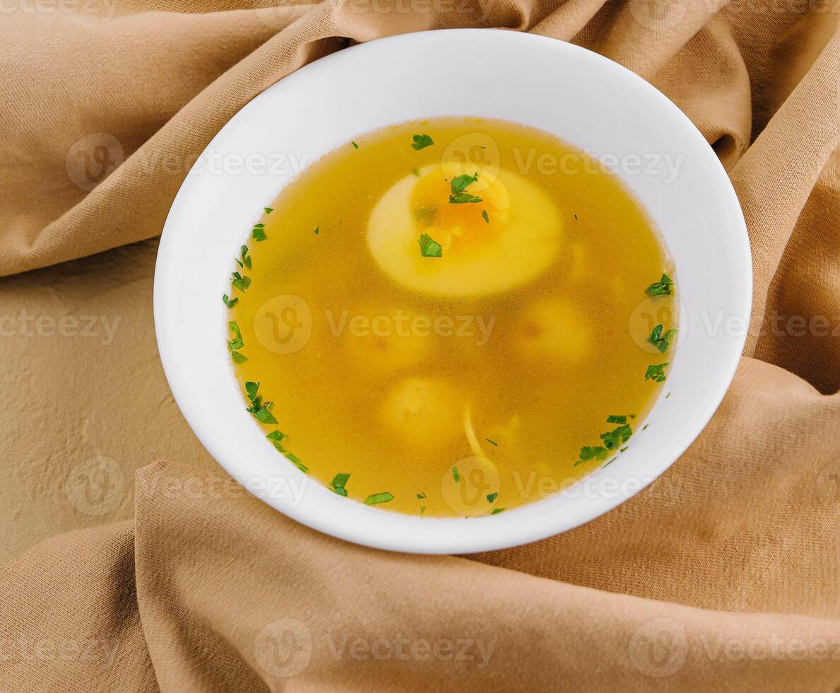 hot soup with meatballs top view photo