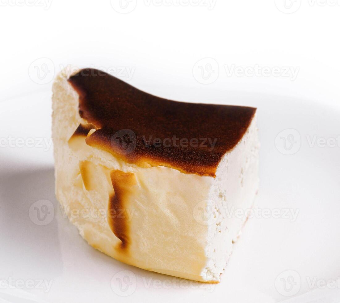 San sebastian cheesecake on plate isolated photo