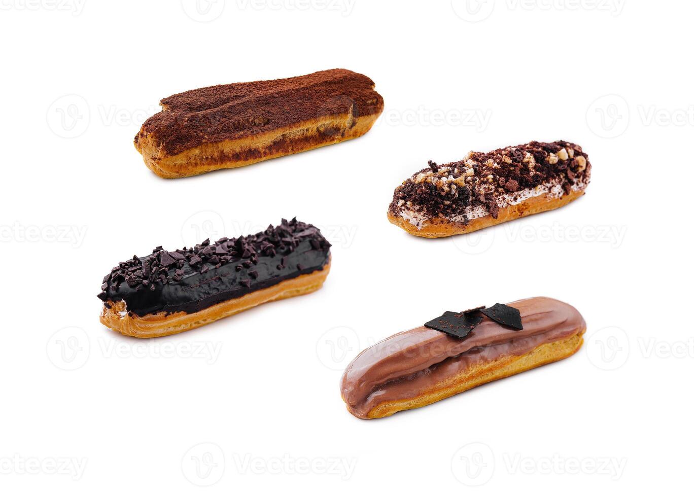 Eclairs with Chocolate Cream and Hazelnuts on White background photo
