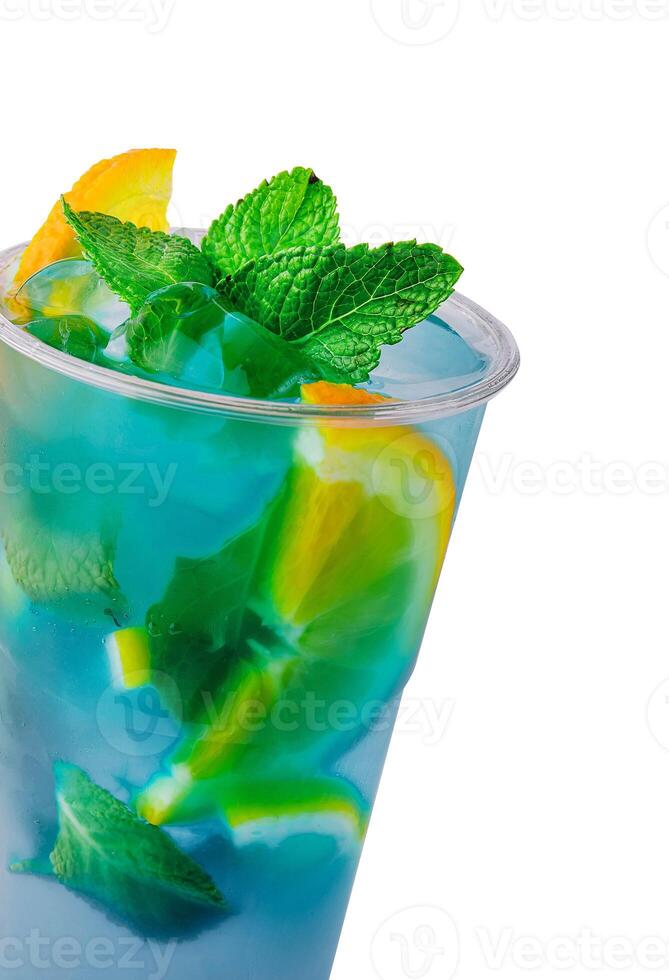 Blue Italian Soda Cold Beverage and Lemon Fruit and mint photo