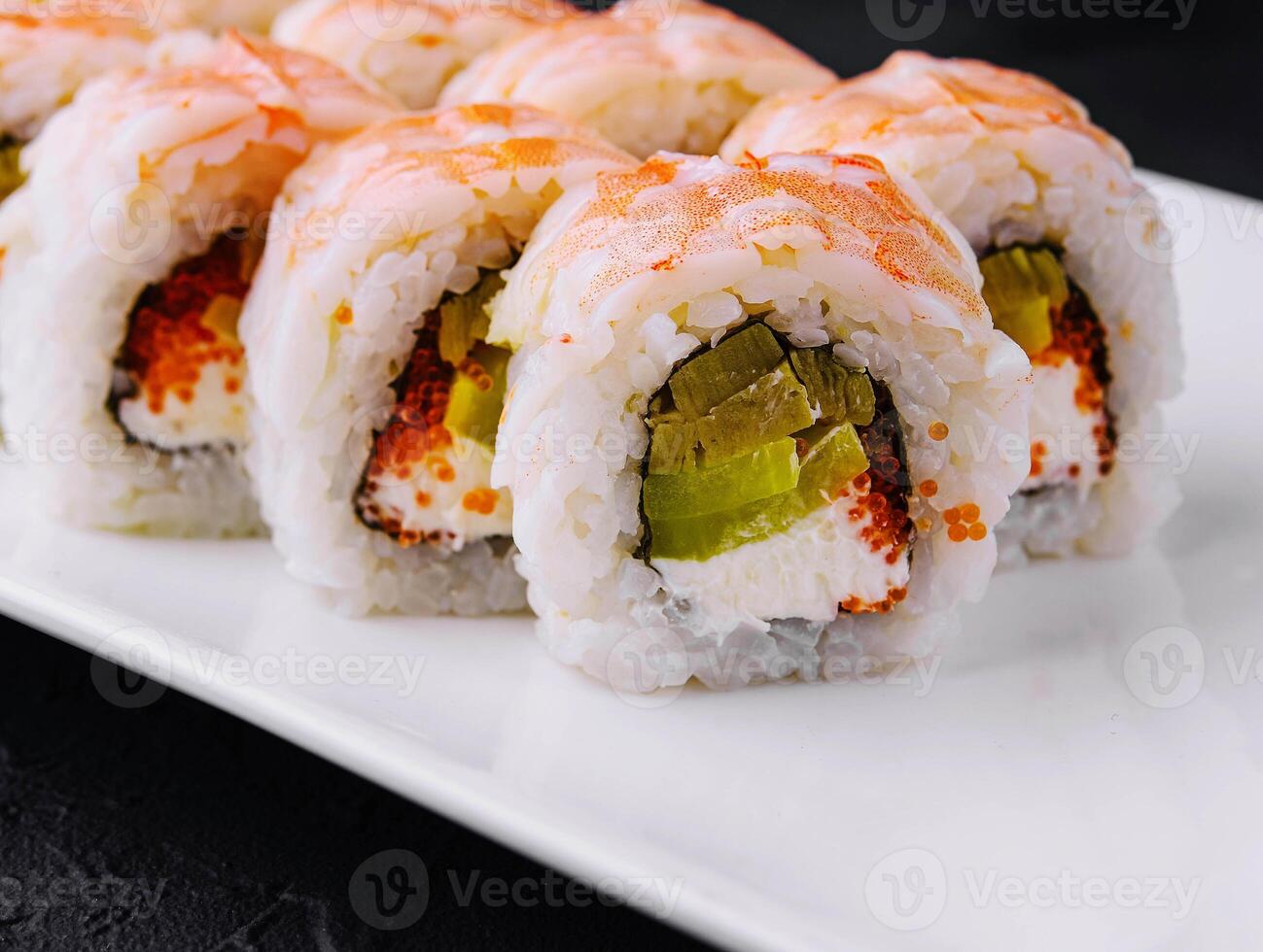 Sushi roll with snow crab and tobiko caviar photo
