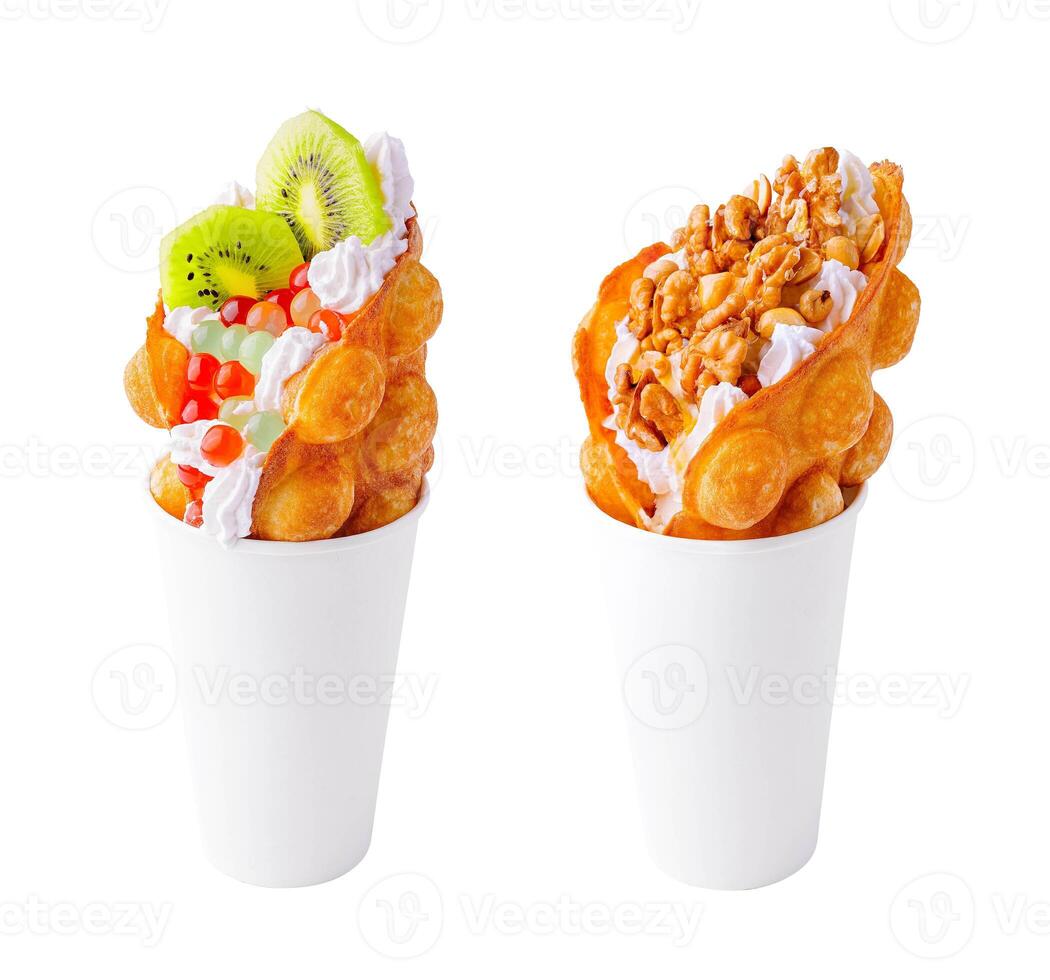 Bubble Waffle with kiwi, walnut, bubble tea and whipped cream photo