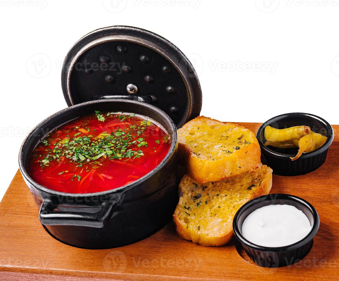 Ukrainian borscht red soup with garlic bread photo