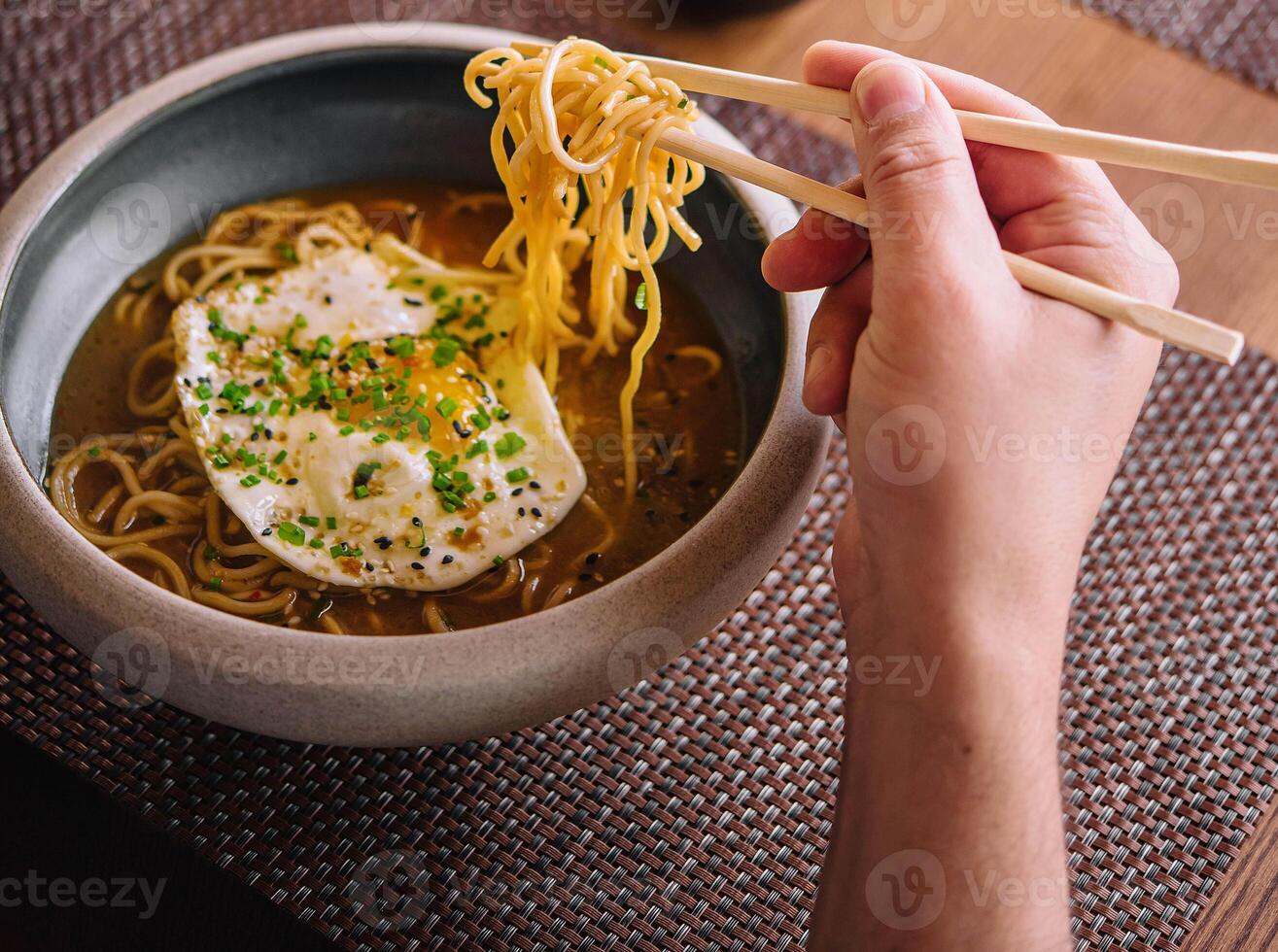 Kimchi noodle spicy soup with egg photo
