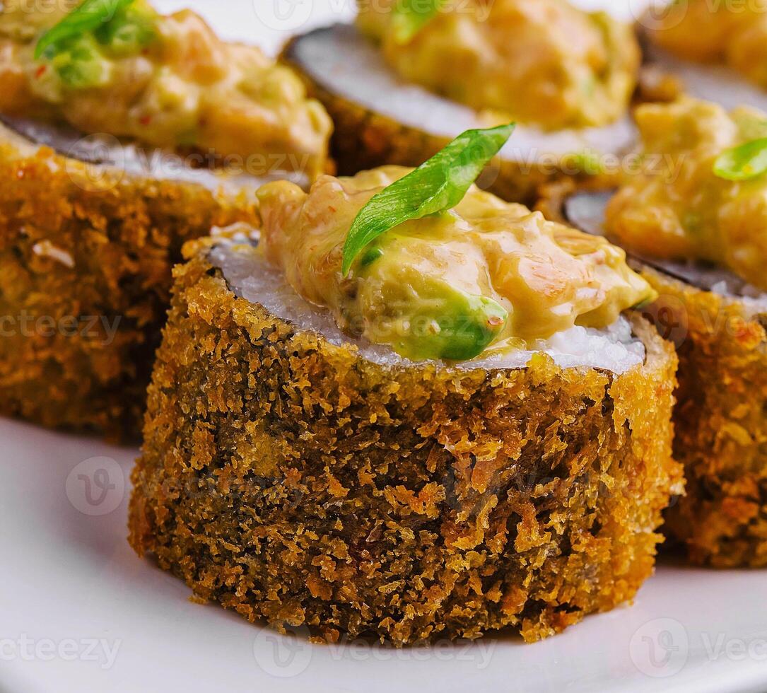 Tempura Maki Sushi on white plate photo
