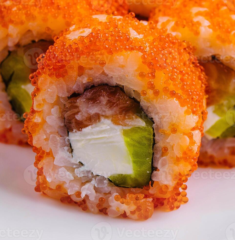 Macro shot of california maki sushi rolls with rice photo