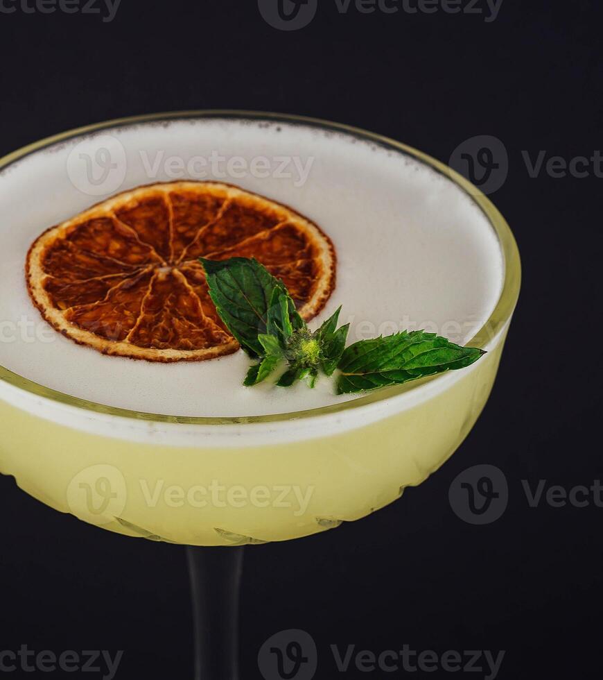 Classic margarita cocktail with mint leaves photo